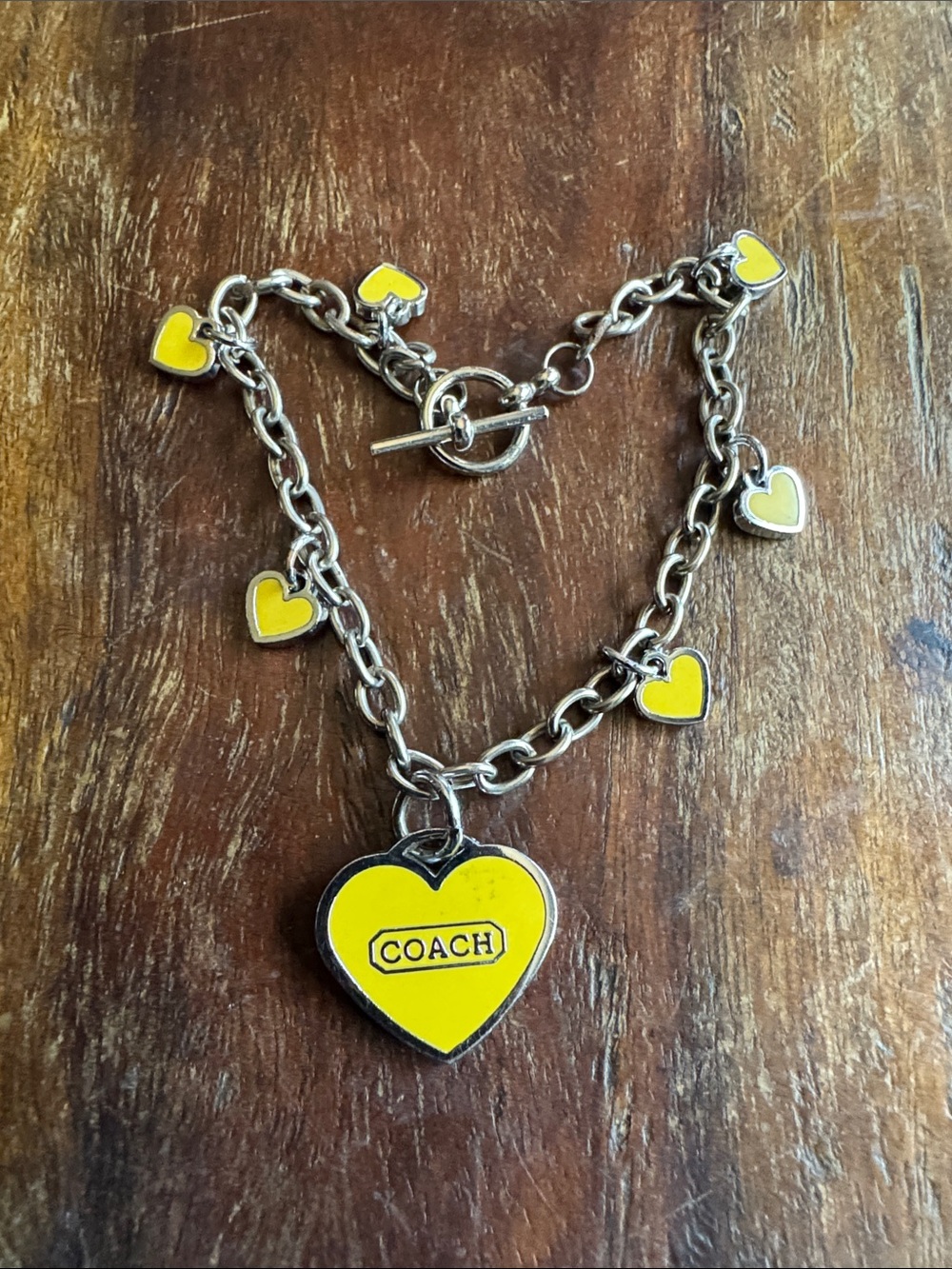 Coach Yellow Enamel Multi-Strand Heart Charm Bracelet